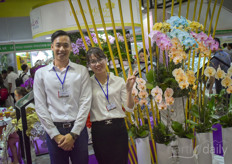 In the photo Robert Wang& Mai le Thi with the dyed orchids.