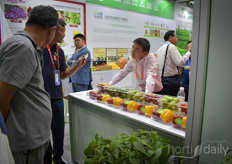 They showed their peppers, one of their greenhouse crops and a growing to the Chinese market.