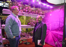 Marc Joulin with Modu-Led shows their LED solutions to a grower.