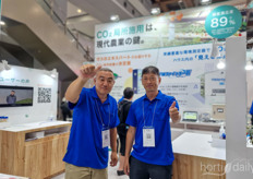 Ichidai Someya and Yasunao Nakata of Koatsu Gas Kogyo seen at the booth where they were explaining about supplying CO2 neutral gases for greenhouses 