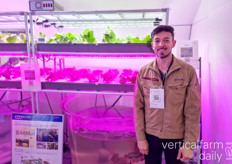 Hernan Ocampos with Espec Mic Corp showing off the company's aquaponics cultivation system 