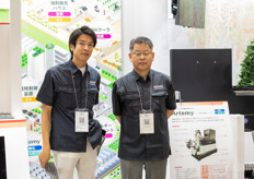 Daisuke Sakurai and Koichi Hamashima showcasing Denso's picking robot, which were getting a lot of attention on the show